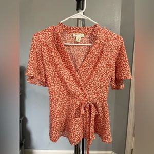 Red floral blouse